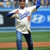 Dodgers great relieves Magic for ceremonial first pitch